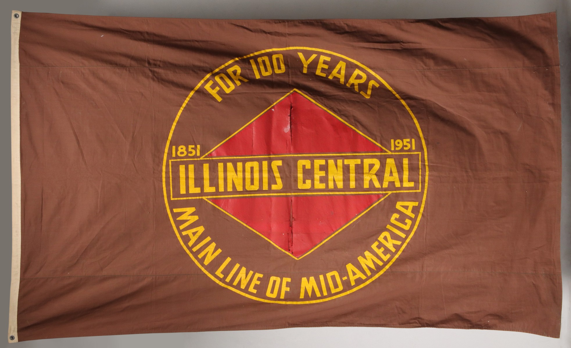 A LARGE ILLINOIS CENTRAL PAINTED CANVAS BANNER