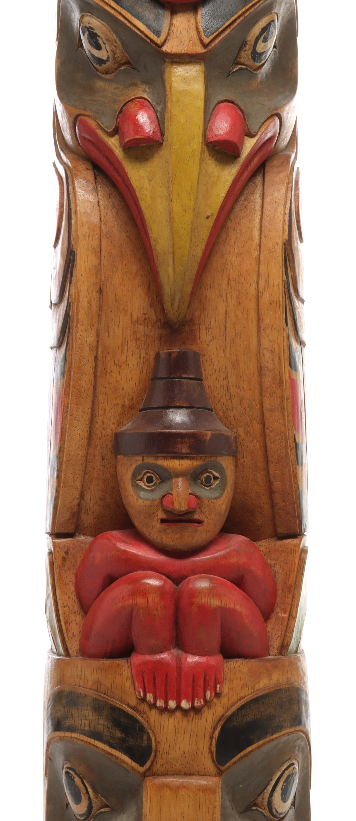 A LATE 20TH C. CARVED AND PAINTED 72-INCH TOTEM POLE