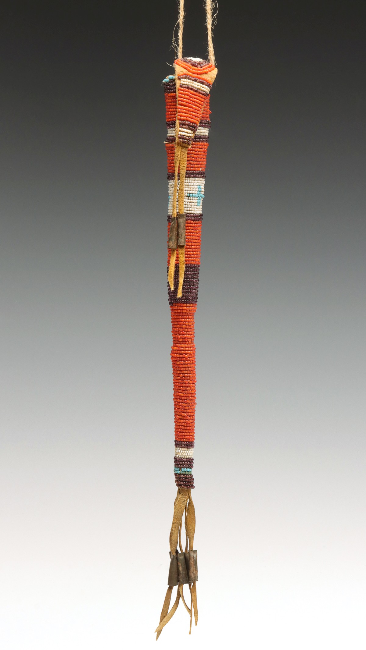 A STRIKING SOUTHERN PLAINS BEADED HIDE AWL CASE C. 1890