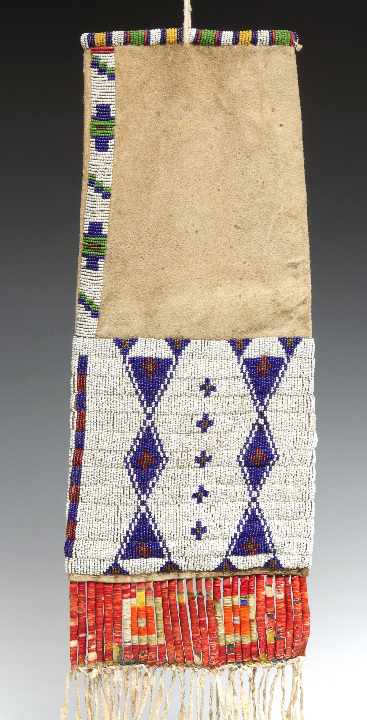 A CIRCA 1900 SIOUX BEADED TOBACCO BAG WITH DYED QUILL