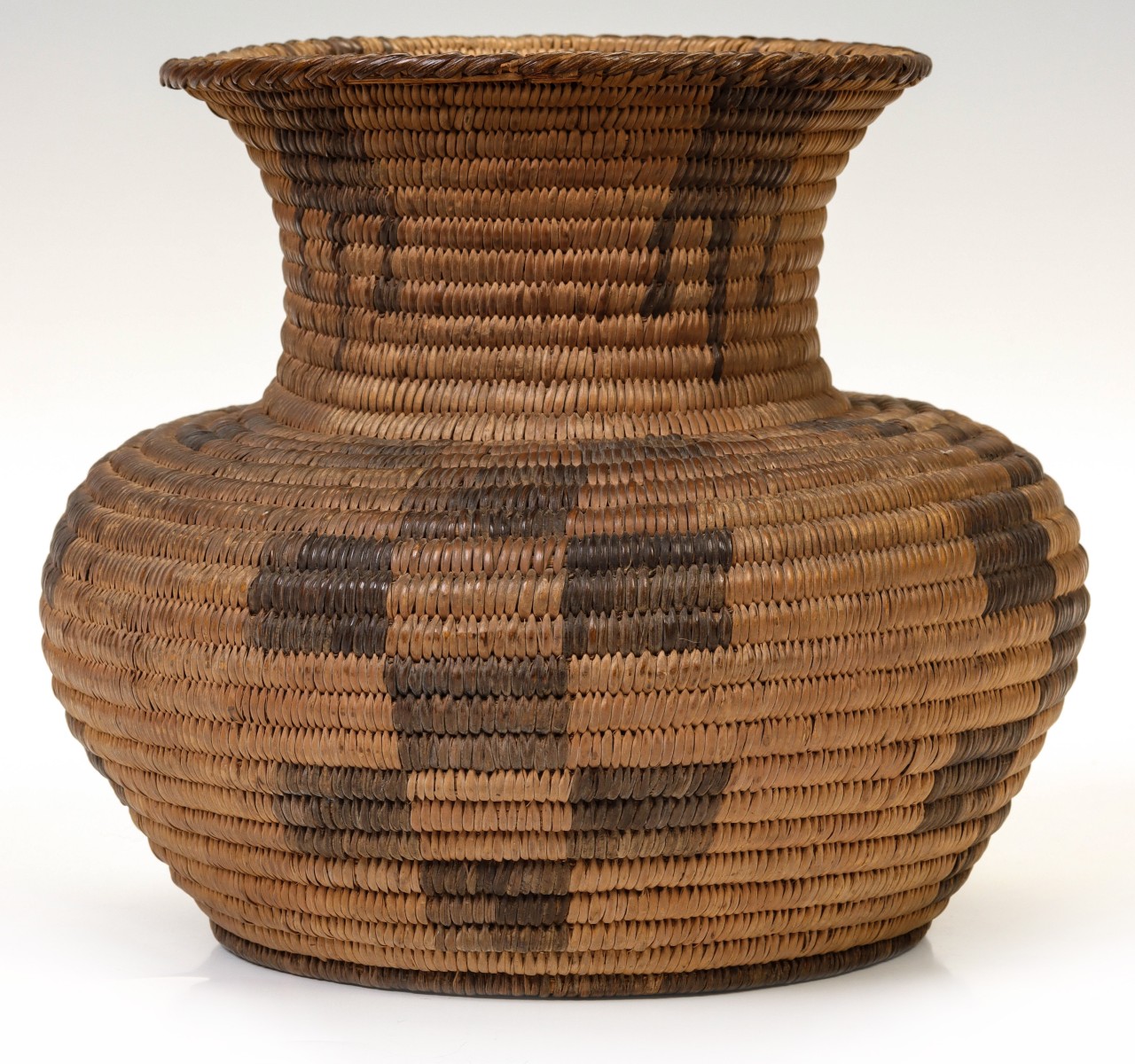 A PIMA BASKETRY OLLA WITH CHECKERBOARD AND BEAR CLAWS