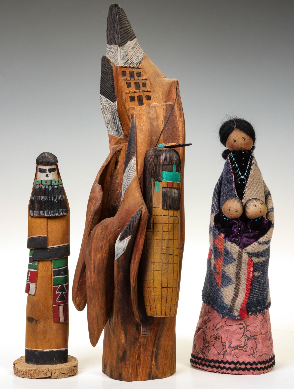 CONTEMPORARY NATIVE AMERICAN CARVED WOOD DOLL FIGURES