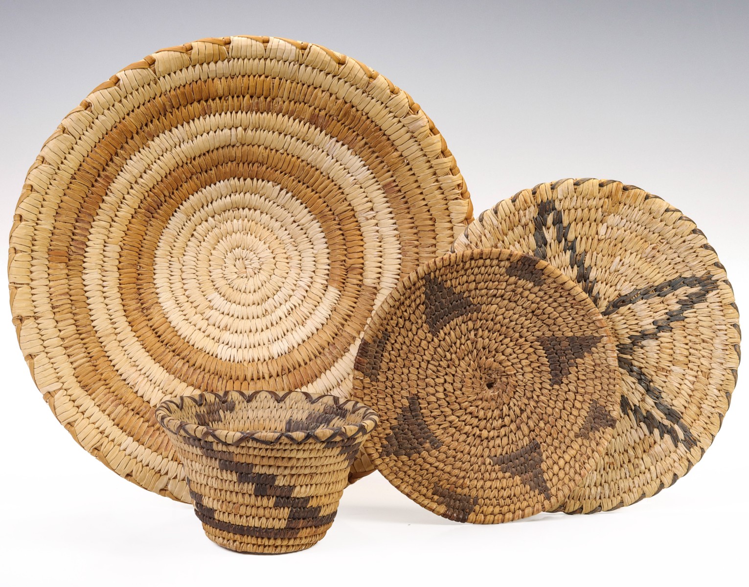 A COLLECTION OF PAPAGO BASKETRY ITEMS