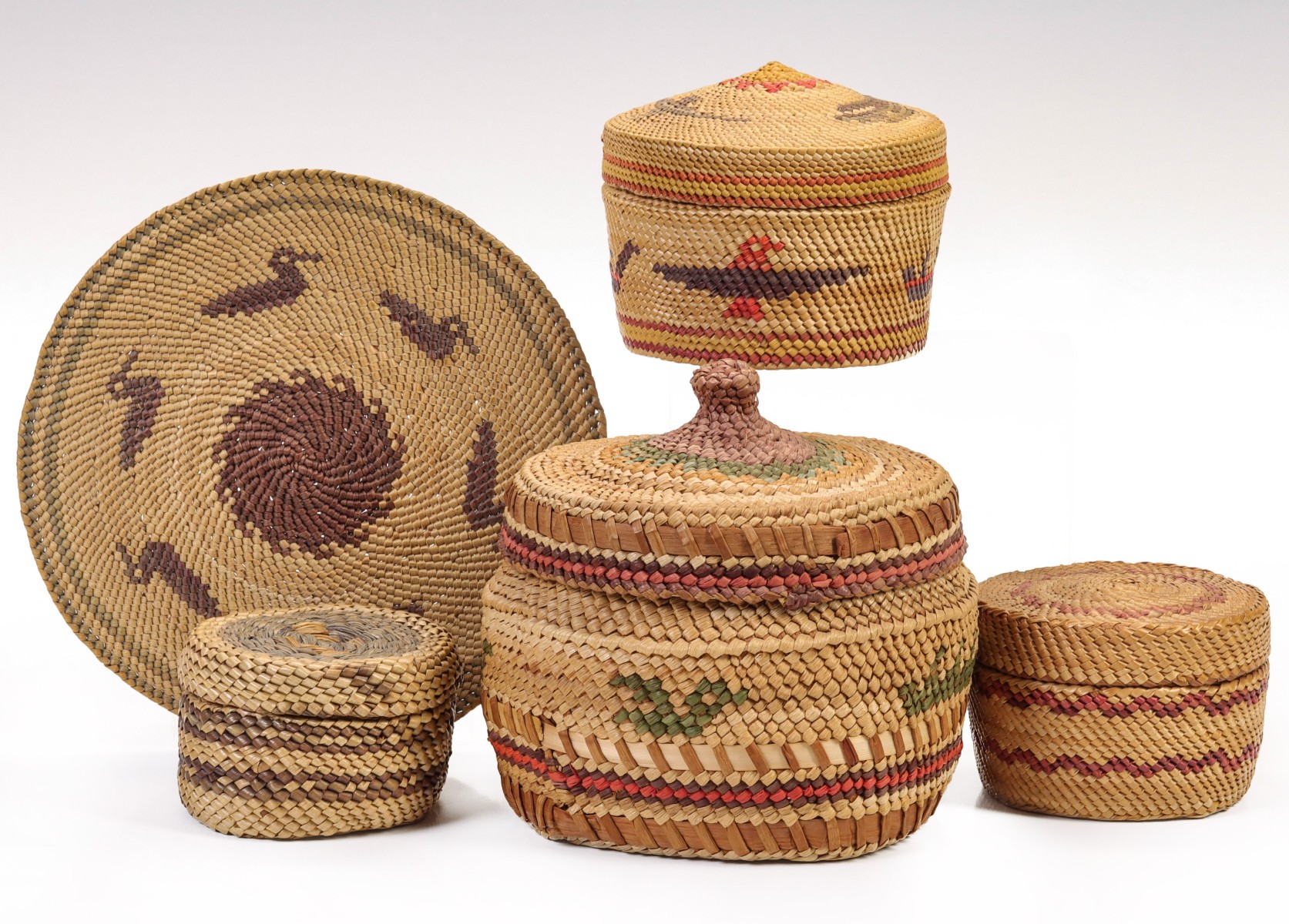A COLLECTION OF MID 20TH C. NW COAST PICTORIAL BASKETRY