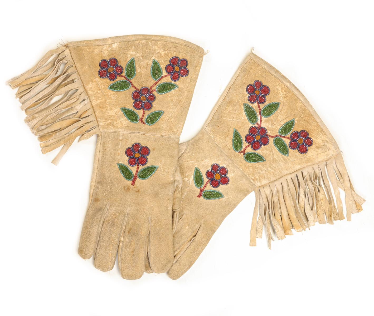 A PAIR OF BEADED HIDE PLATEAU GAUNTLETS CIRCA 1920
