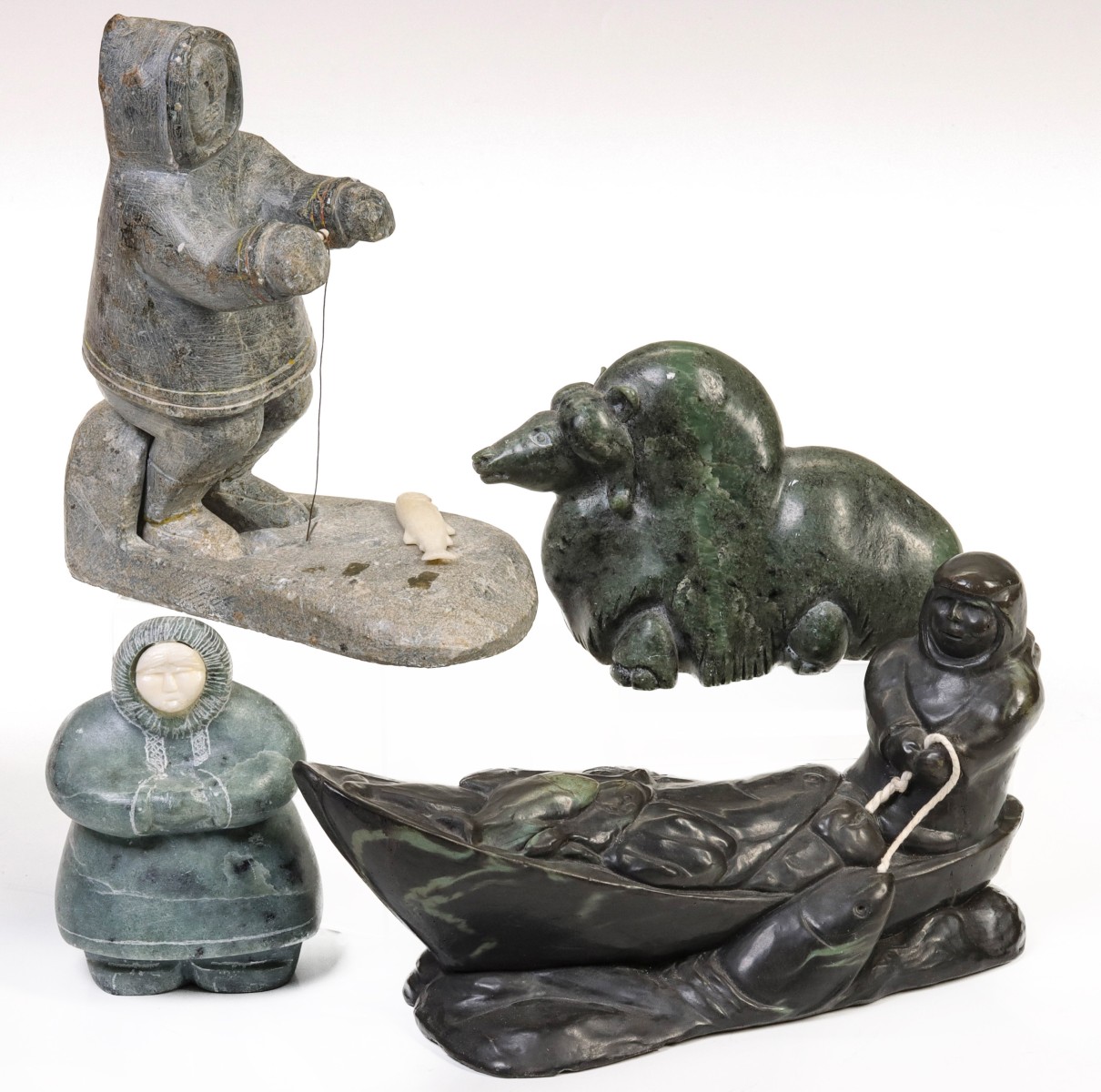 A COLLECTION OF INUIT SOAPSTONE CARVINGS