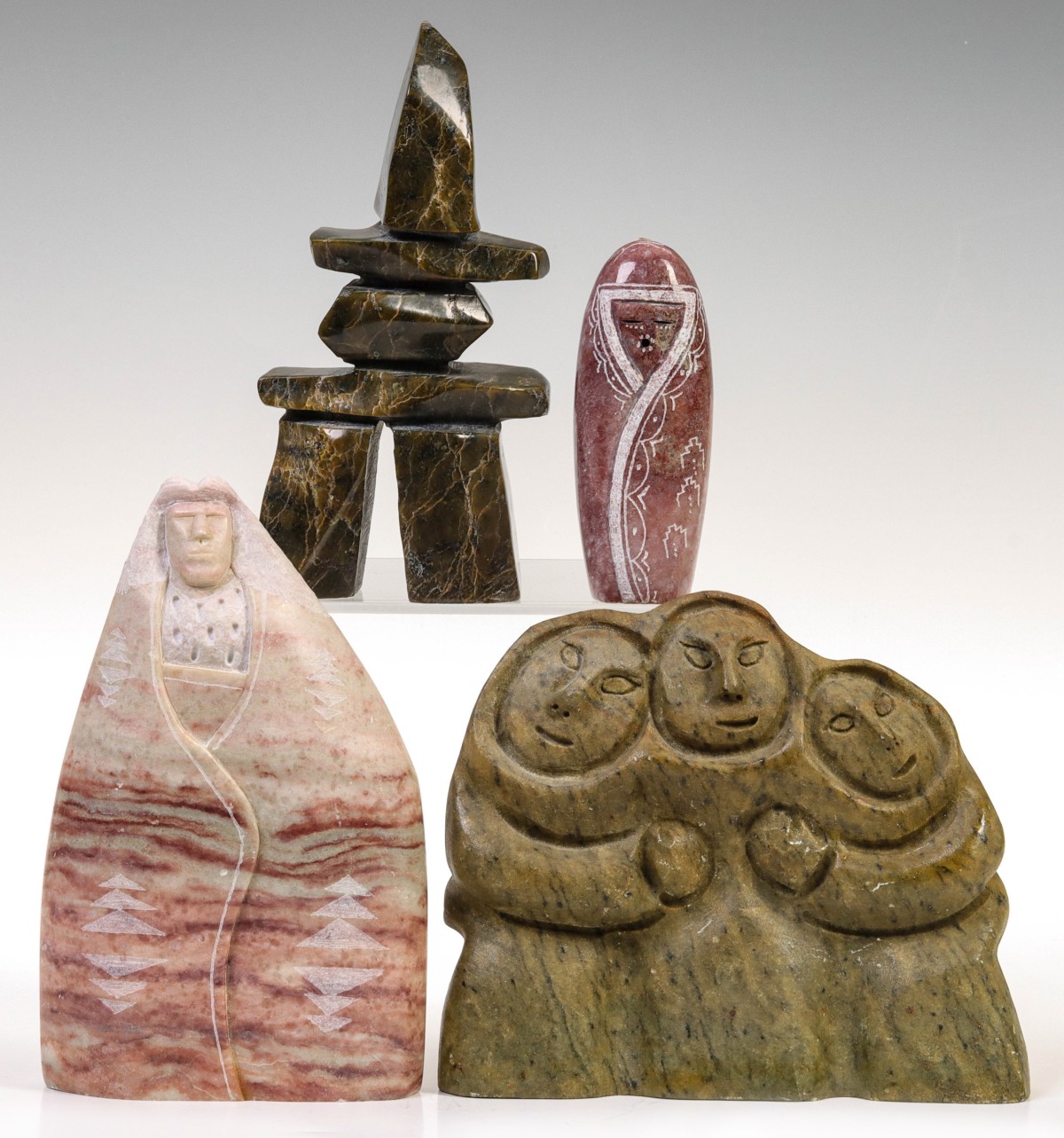 A COLLECTION OF NATIVE AMERICAN MOTIF CARVINGS