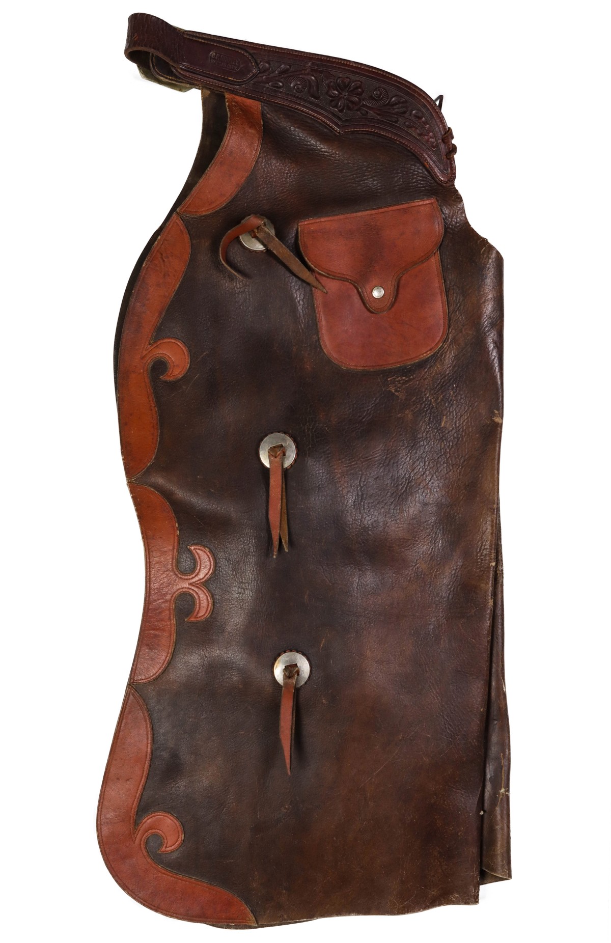 A PAIR OF C.P. SHIPLEY TWO COLOR STEER HIDE CHAPS