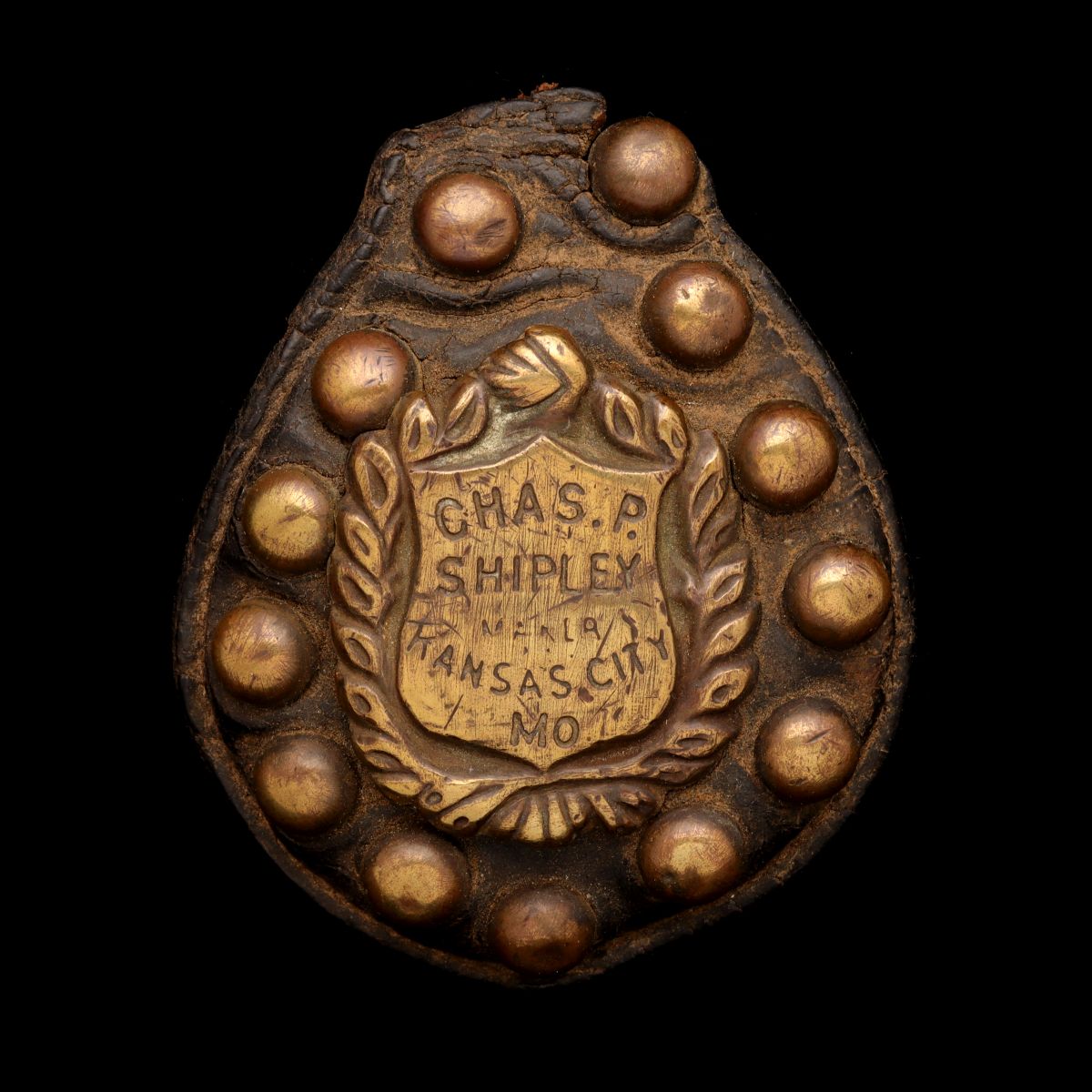 A CHAS P. SHIPLEY BRASS MOUNTED MAKER'S TAG