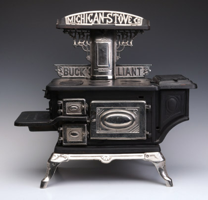 A Collection of Sample and Toy Cast‑Iron Stoves