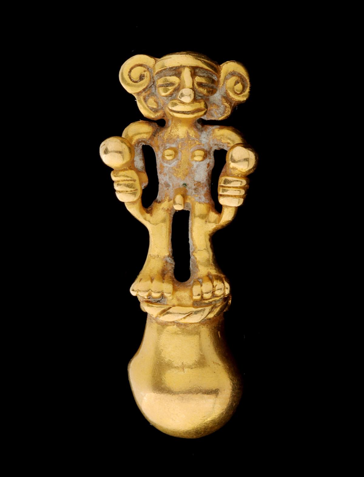A PRE-COLUMBIAN STYLE 14K GOLD FIGURAL BELL PENDANT