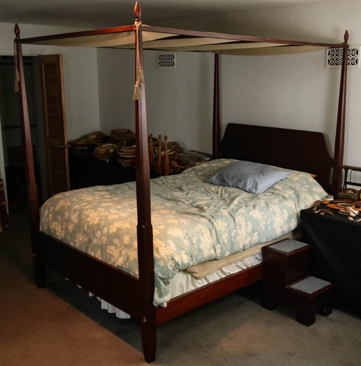 A FOUR POST TESTER BED WITH STEPS