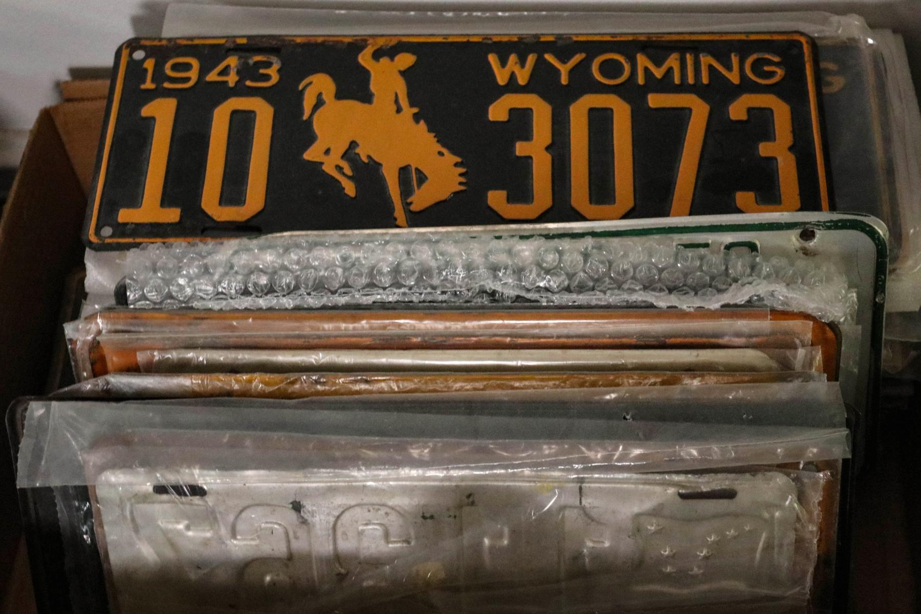 A COLLECTION OF VINTAGE LICENSE PLATES