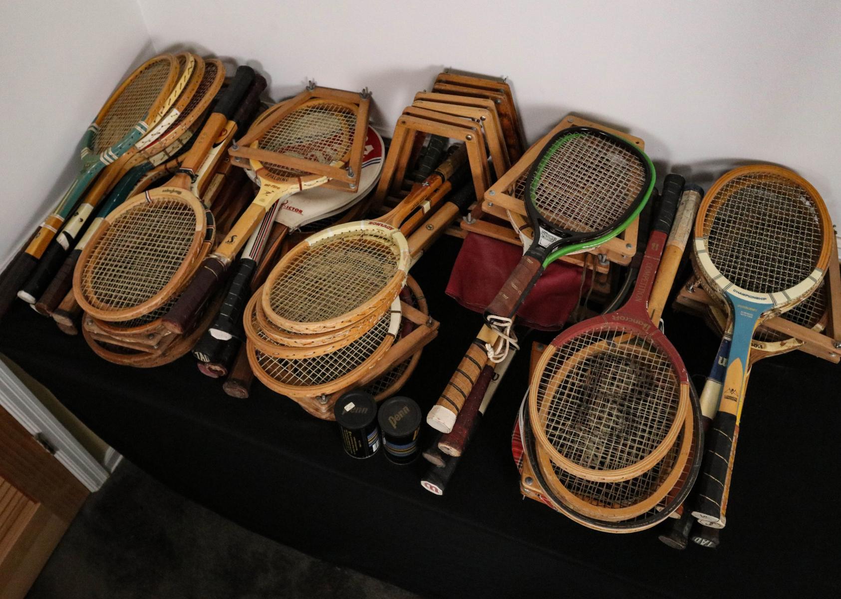 A LARGE COLLECTION OF TENNIS RACKETS
