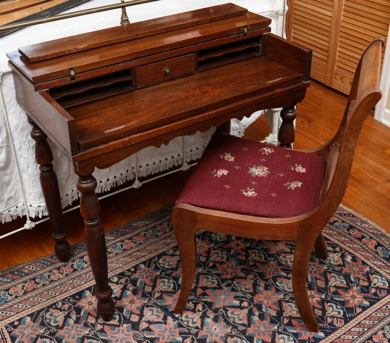 A 1940s SPINET DESK WITH NEEDLEPOINT SEAT CHAIR
