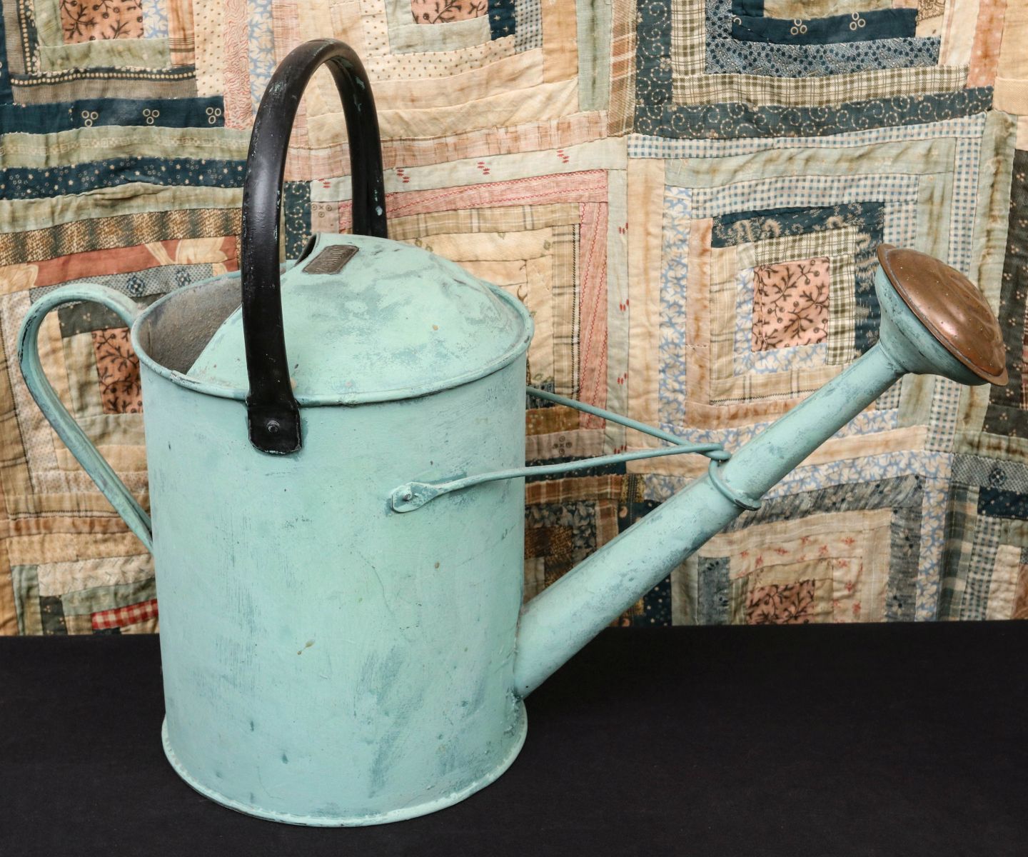 AN ANTIQUE TWO GALLON WATERING CAN