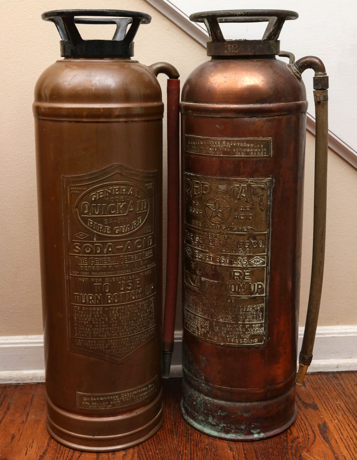 TWO ANTIQUE COPPER FIRE EXTINGUISHERS WITH BRASS