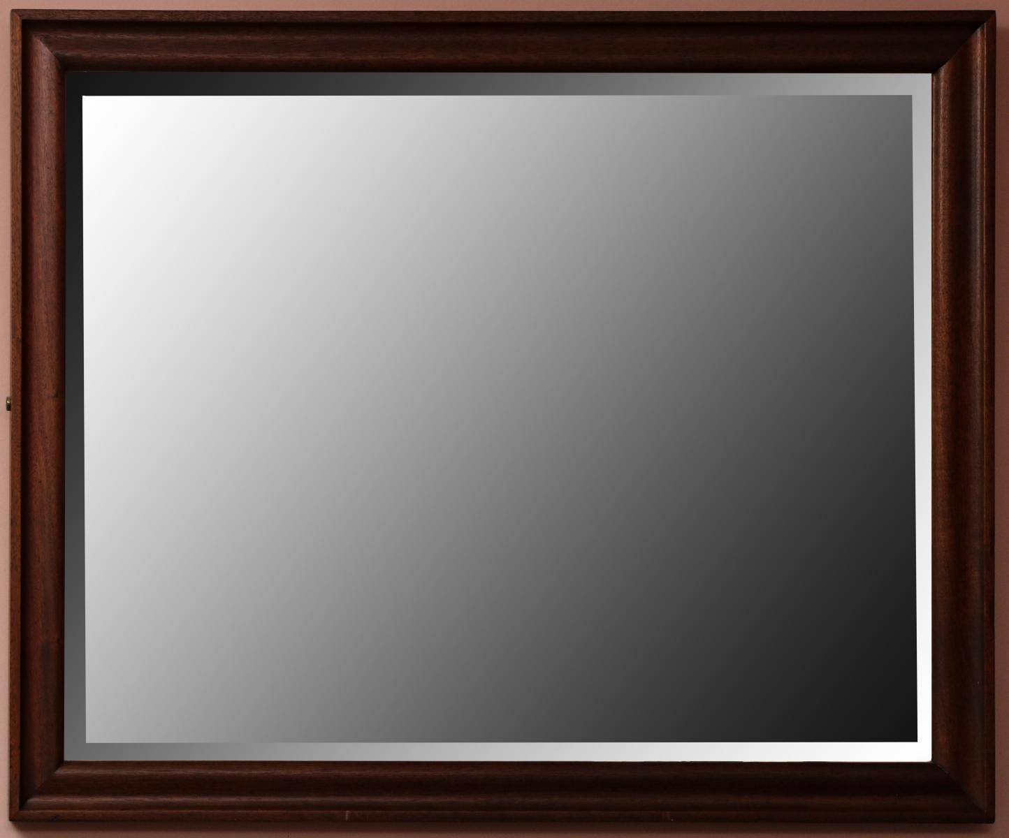 A LARGE BEVELED PLATE MIRROR IN WOOD FRAME