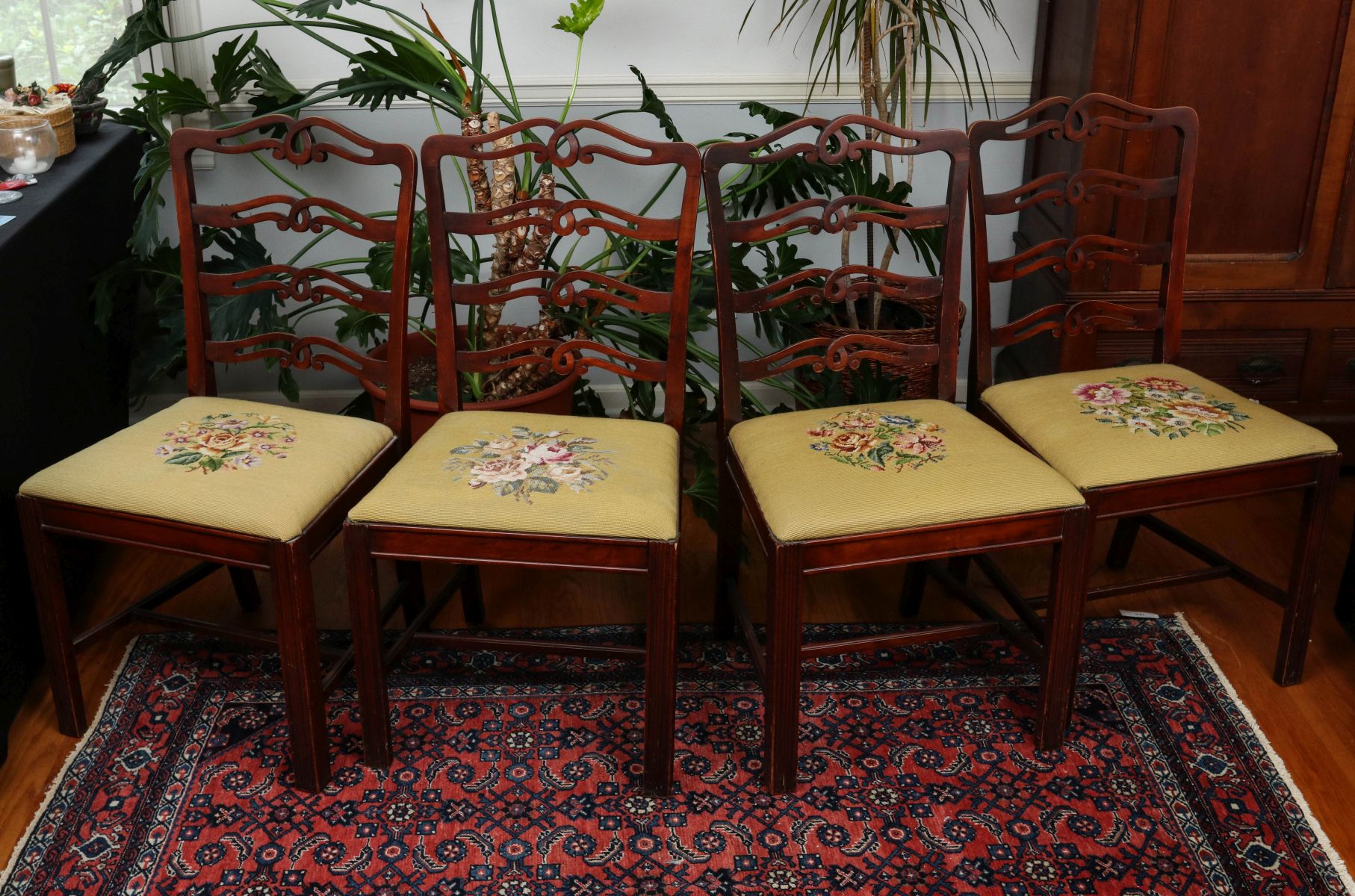FOUR 20TH C. CHIPPENDALE STYLE NEEDLEPOINT CHAIRS