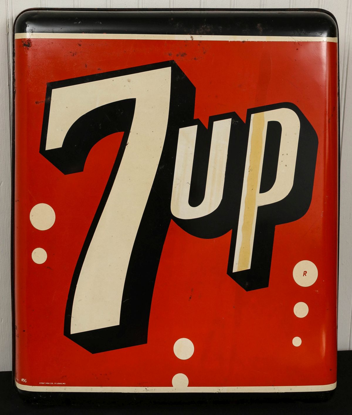 A 1960s TIN ADVERTISING SIGN FOR 7UP