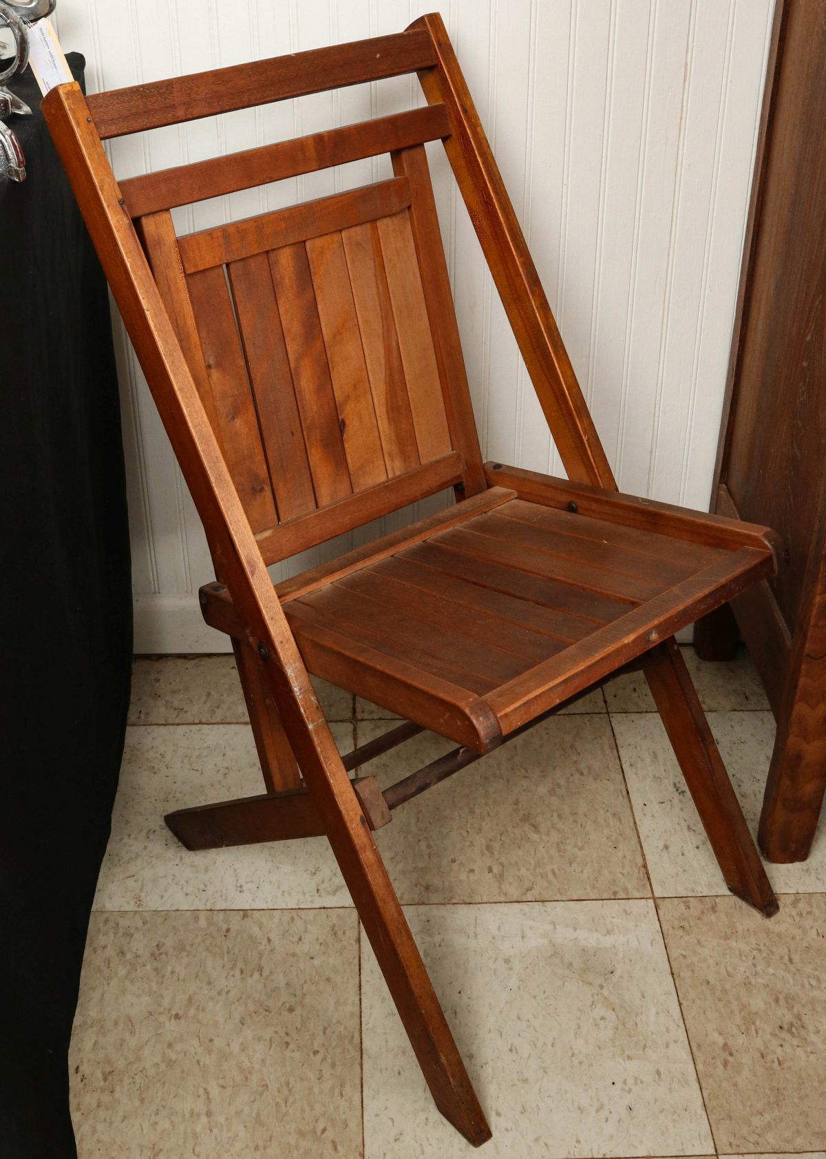 FOUR EARLY 20TH CENTURY WOOD FOLDING CHAIRS