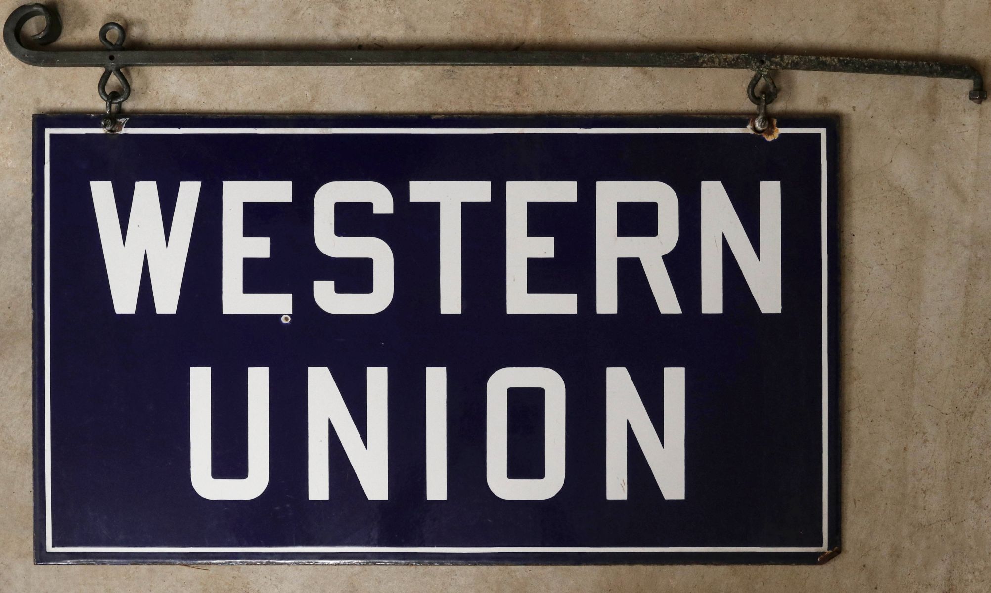 A TWO-SIDED WESTERN UNION PORCELAIN ENAMEL SIGN