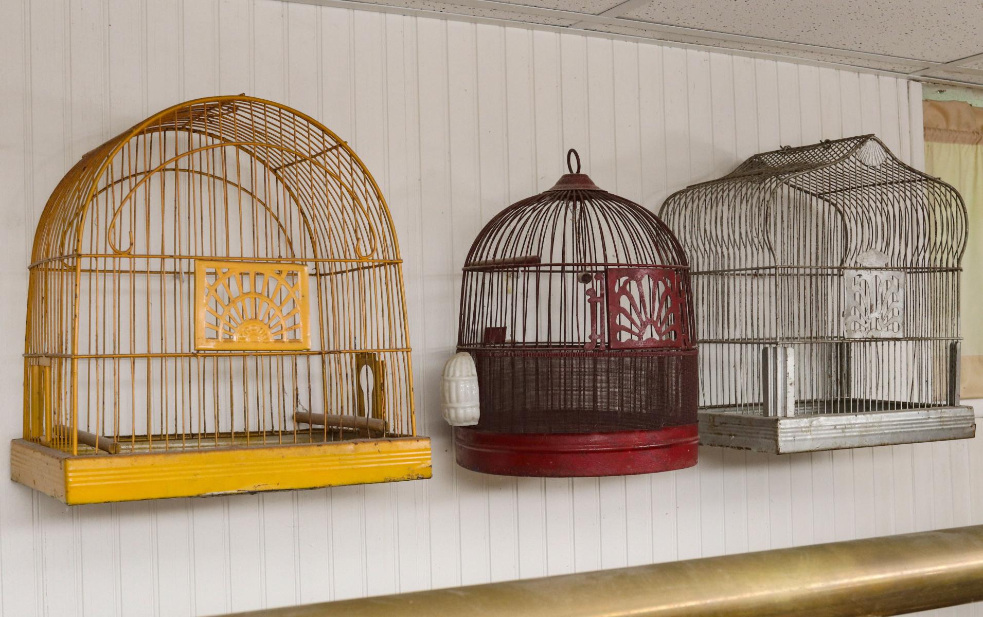 THREE STYLISH SEMI-ANTIQUE BIRD CAGES CIRCA 1930