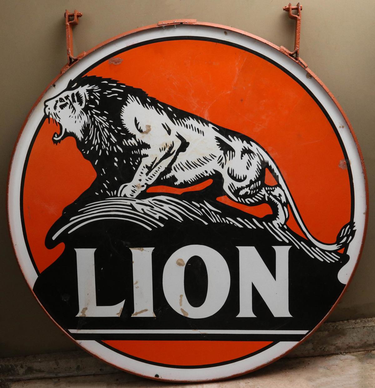 A LION OIL DOUBLE SIDED PORCELAIN ADVERTISING SIGN