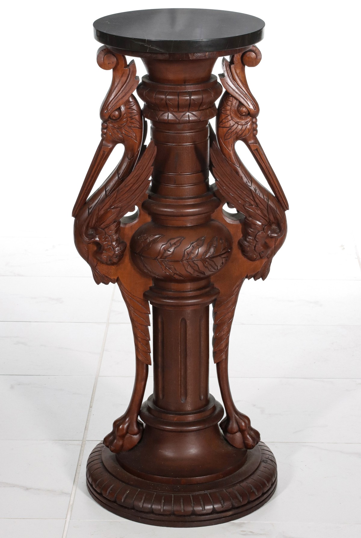 A GOOD CARVED WALNUT PEDESTAL WITH WINGED FIGURES