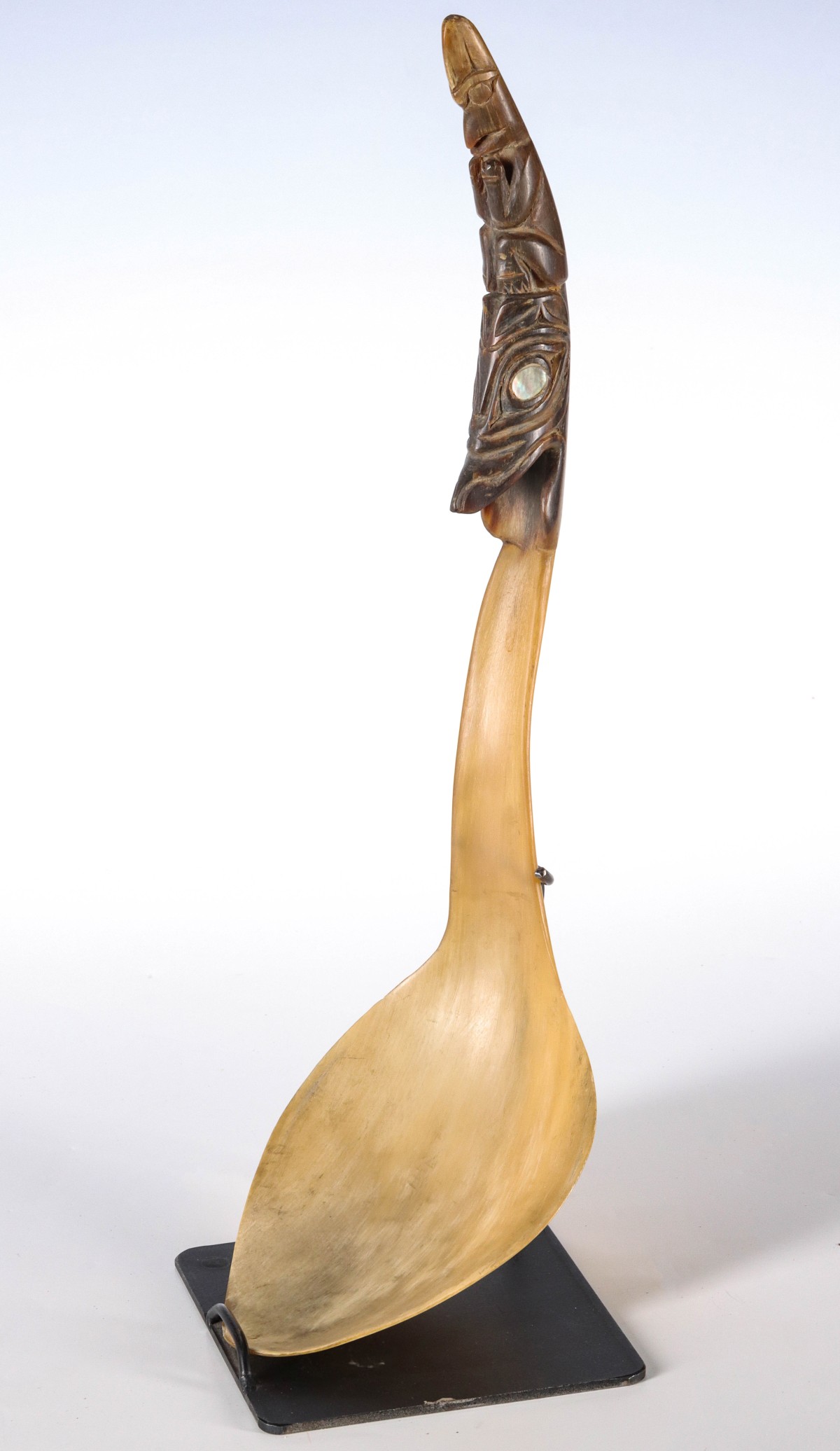 A 19TH C. ESKIMO CARVED HORN LADLE WITH TOTEMIC HANDLE