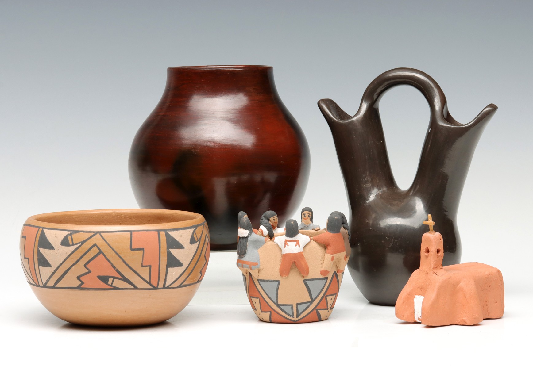 A COLLECTION OF FIVE NATIVE AMERICAN POTTERY WORKS