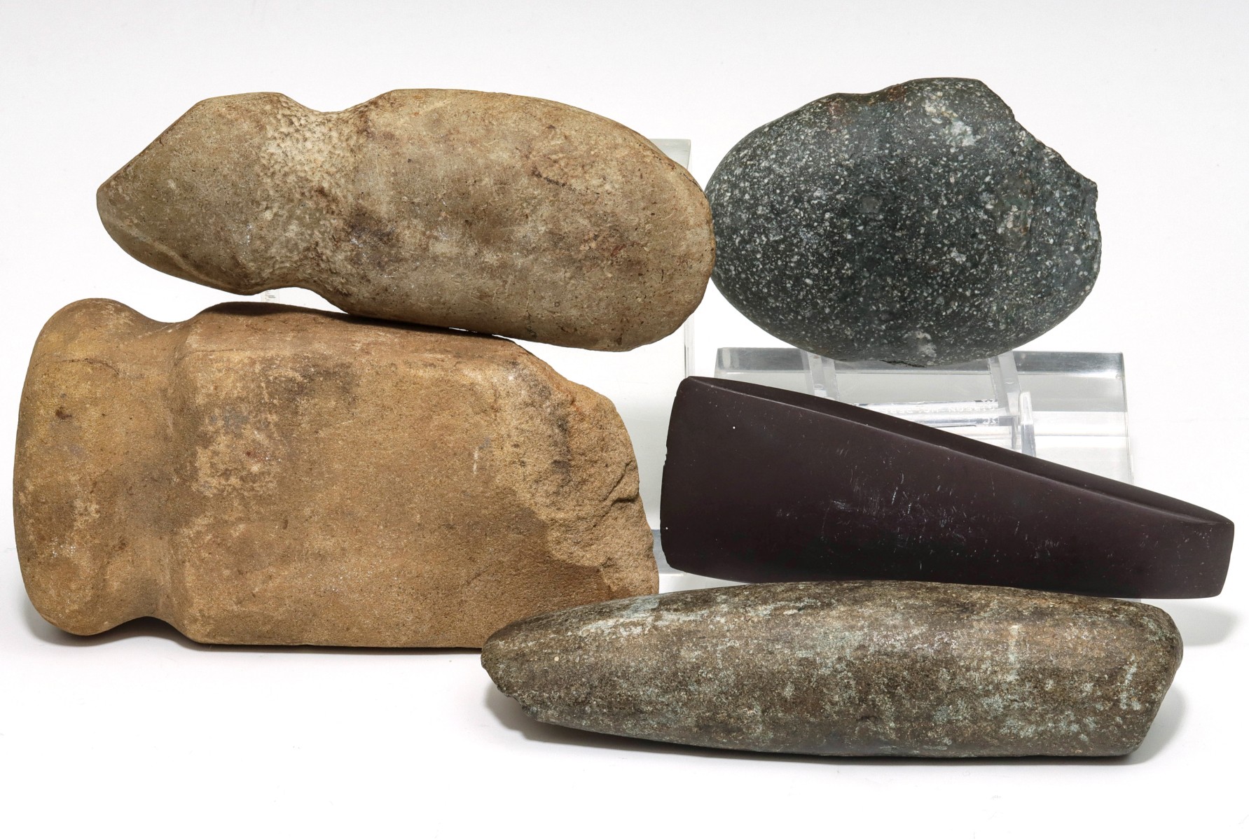 A COLLECTION OF PREHISTORIC STONE TOOLS