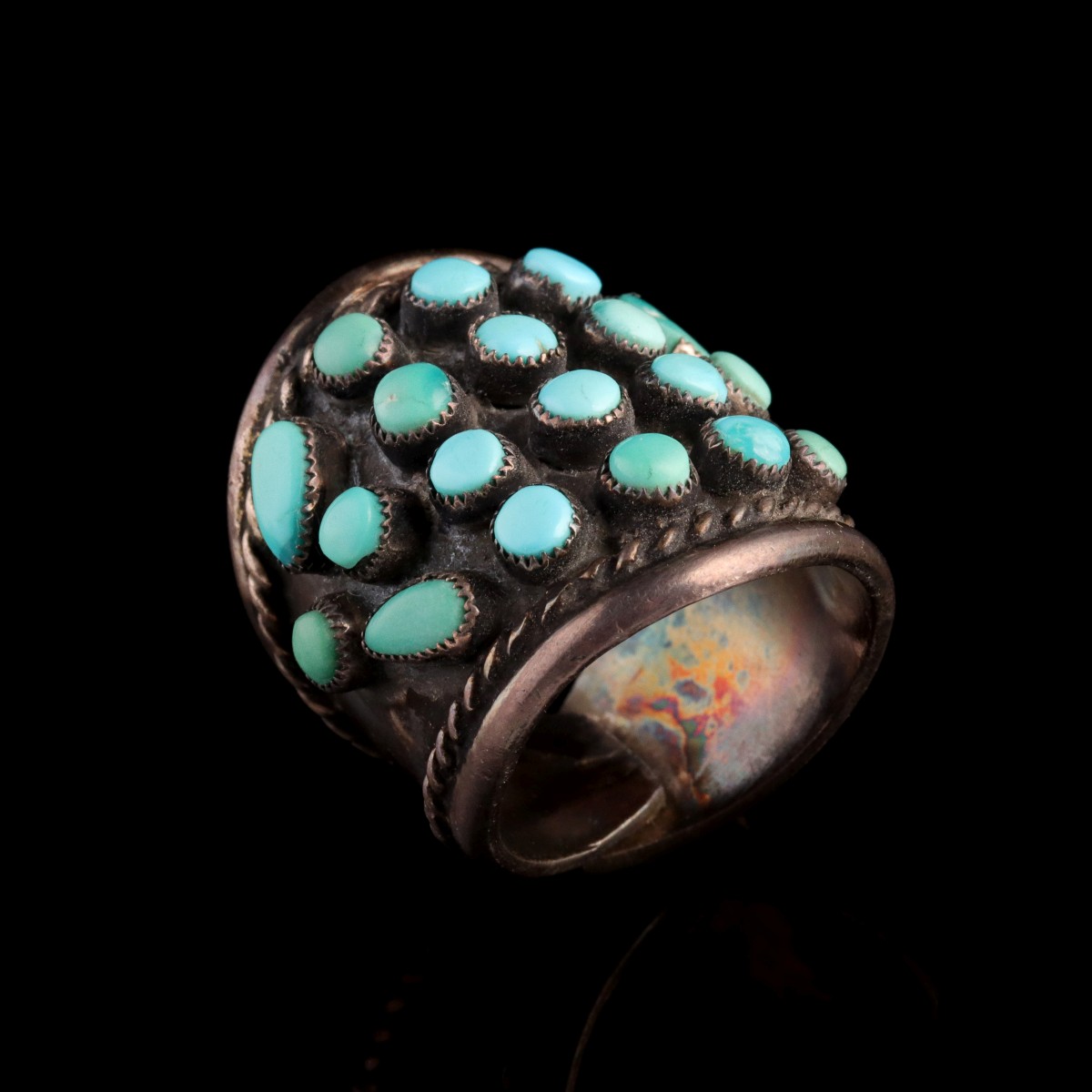 A STERLING SILVER RING WITH PERSIAN TURQUOISE