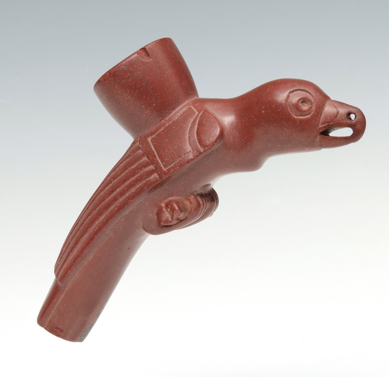 A RAVEN EFFIGY CARVED CATLINITE PIPE BOWL