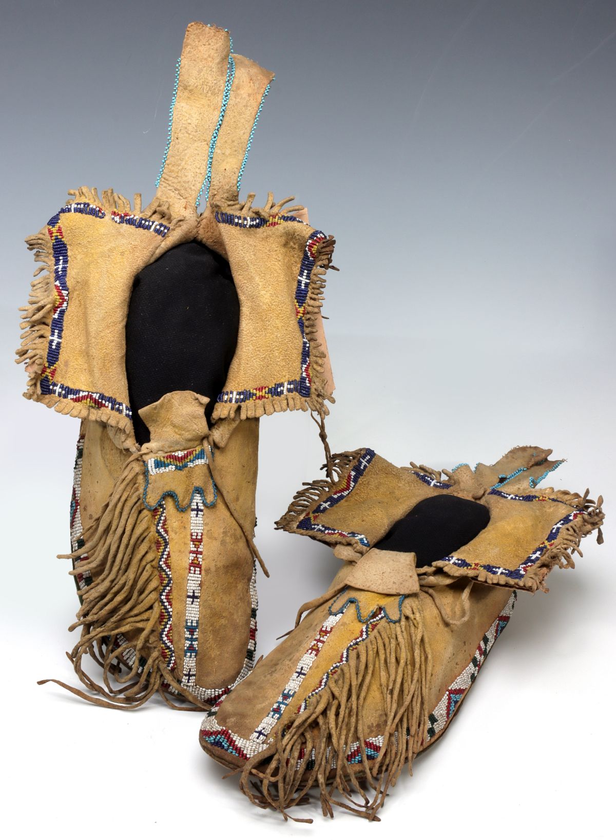 HEAVILY FRINGED SOUTHERN PLAINS BEADED MOCCASINS