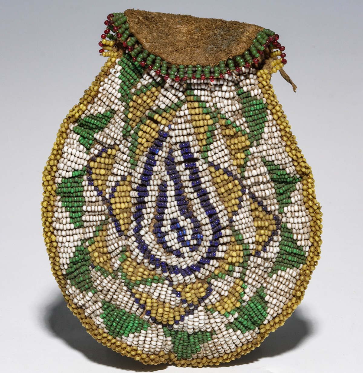 A BEADED HIDE POUCH, POSSIBLY UTE, CIRCA 1900
