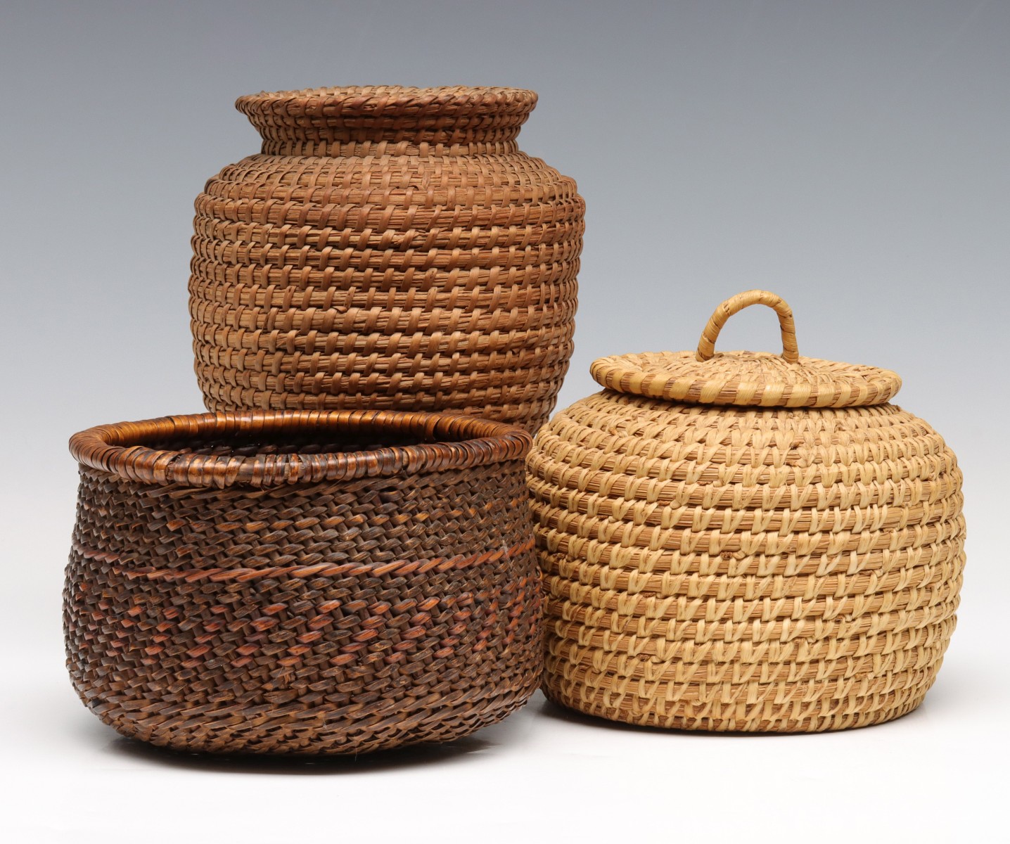 SOUTHEAST SWEET GRASS AND NW COAST COILED ROD BASKETS