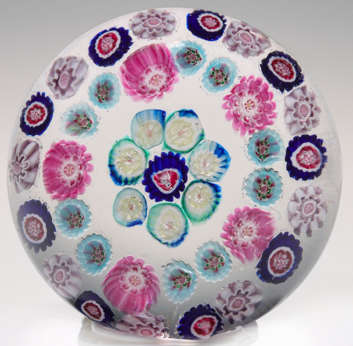 AN ANTIQUE CLICHY MINIATURE PAPERWEIGHT WITH MILLEFIORI