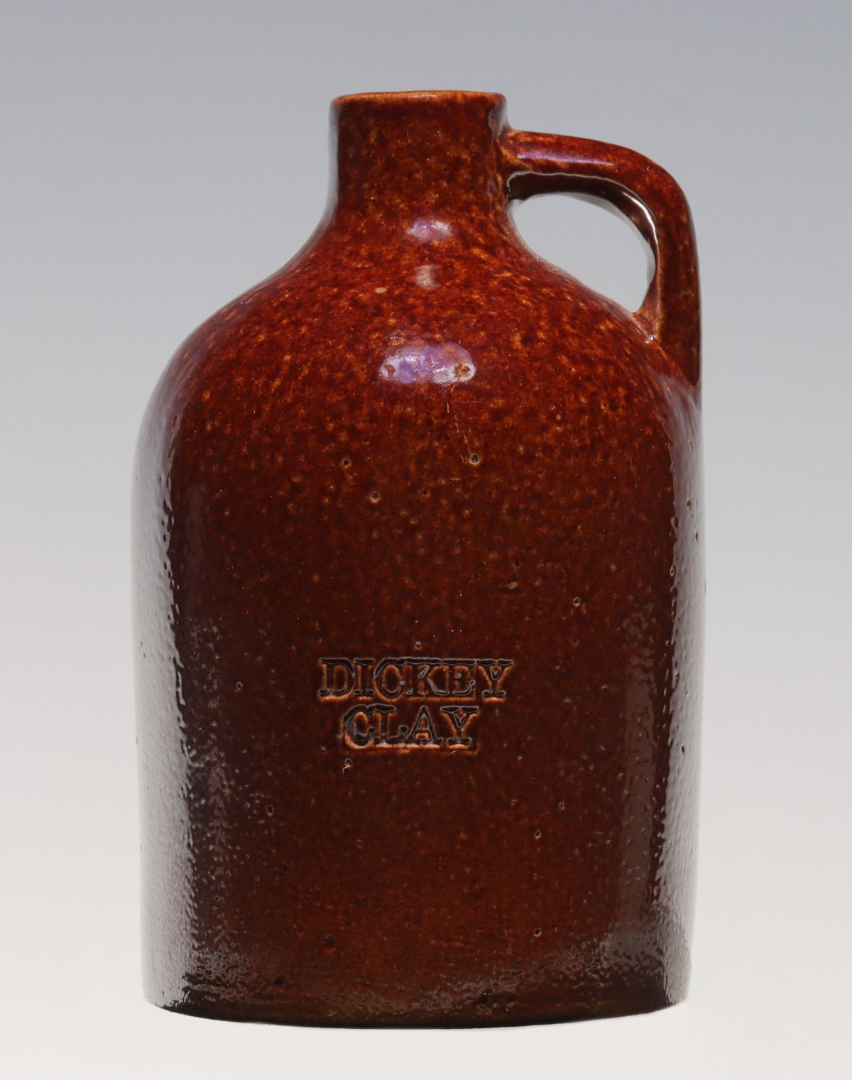 A DICKEY CLAY SEWER TILE TYPE CLAY AND GLAZE MINI JUG