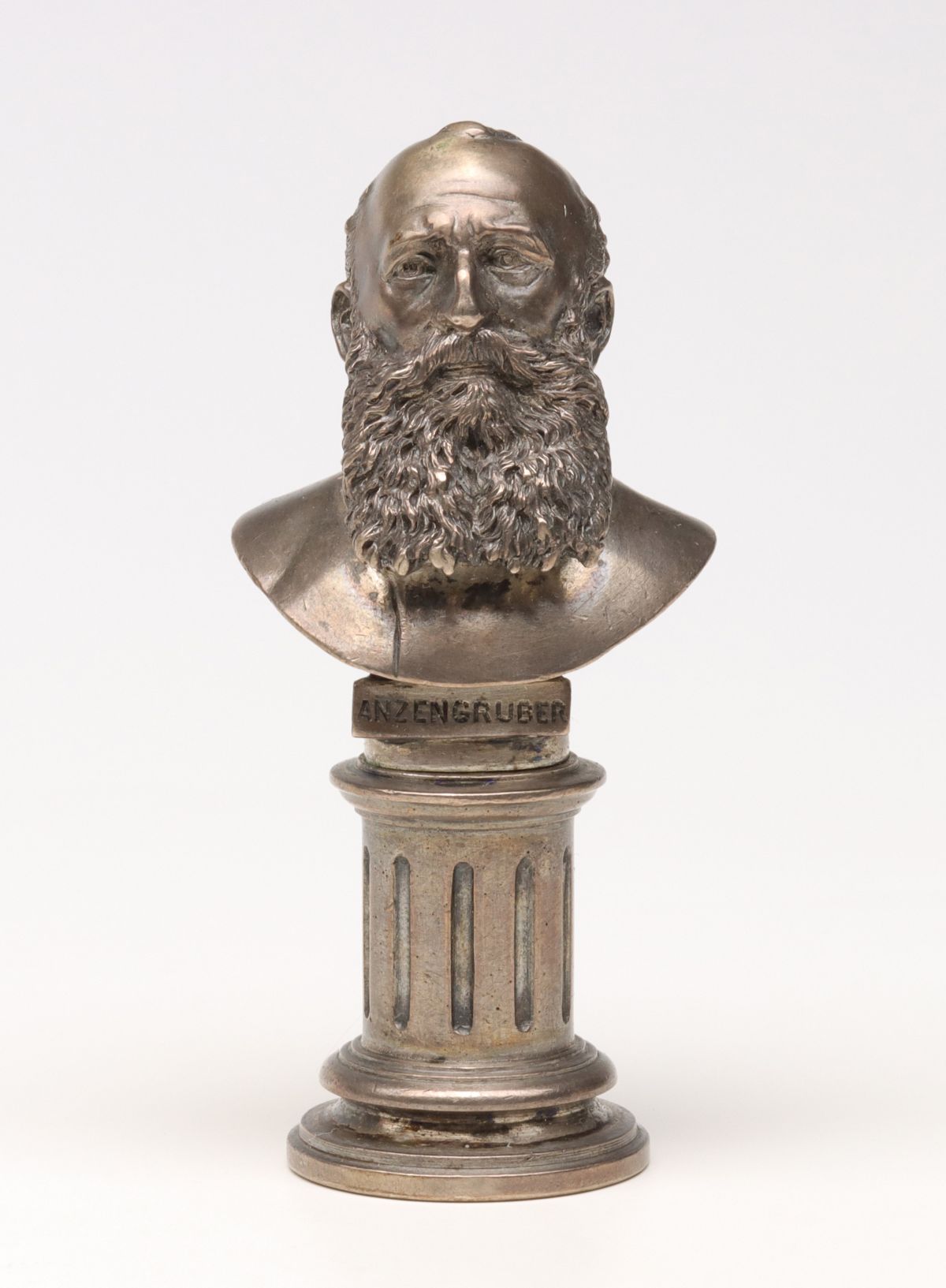 SILVER PLATED BUST OF ANZENGRUBER ON ANTIQUE WAX SEAL