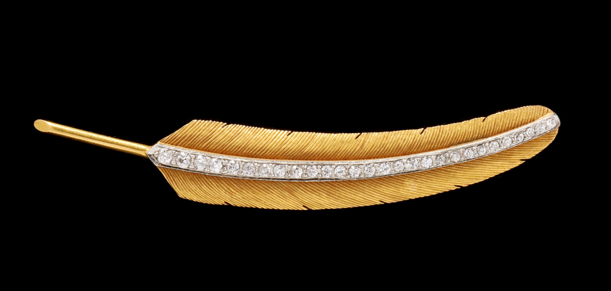A WEINMAN BROTHERS 14K GOLD AND DIAMOND FEATHER BROOCH