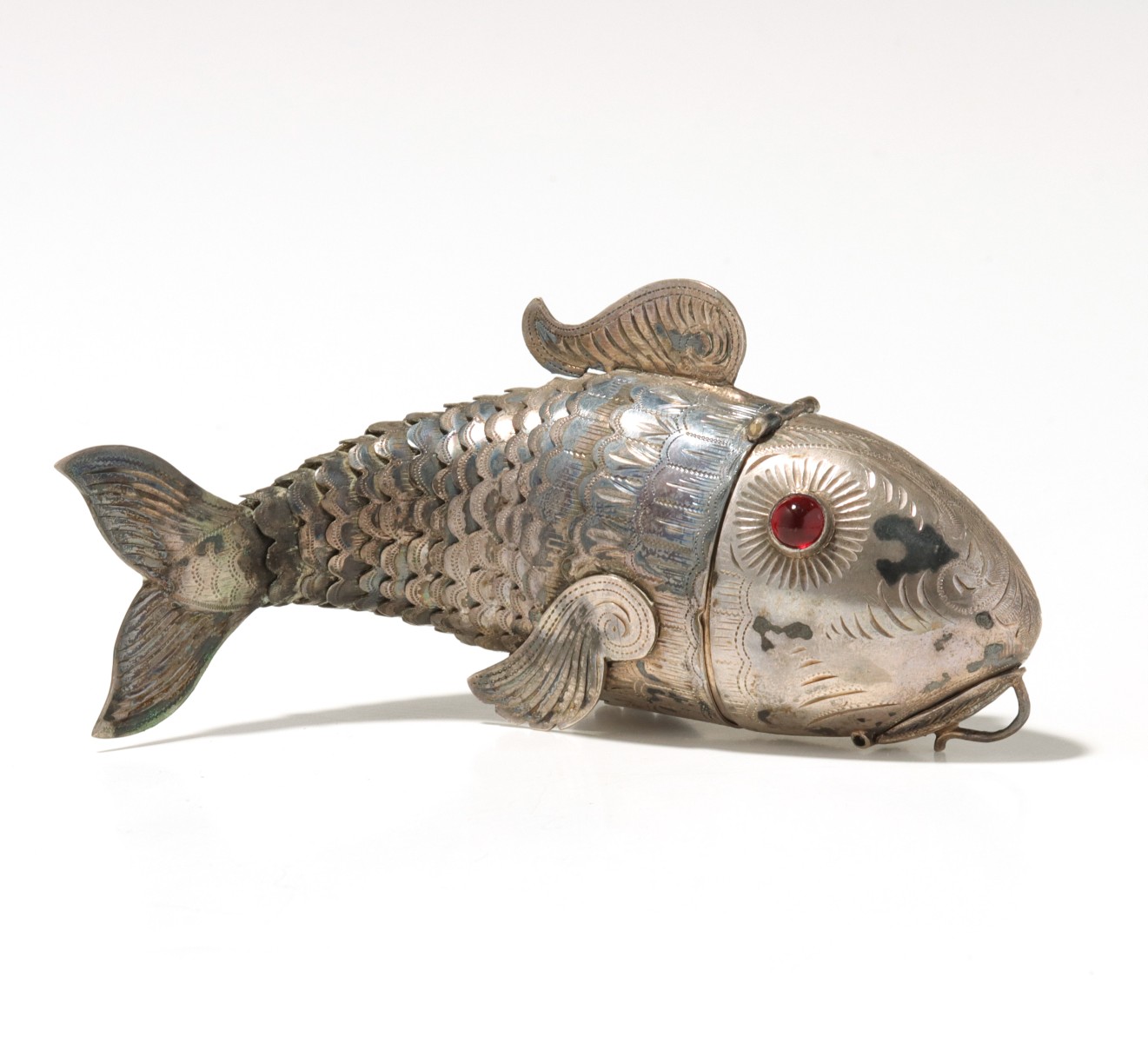 A CONTINENTAL SILVER ARTICULATED FISH JUDAICA SPICE BOX