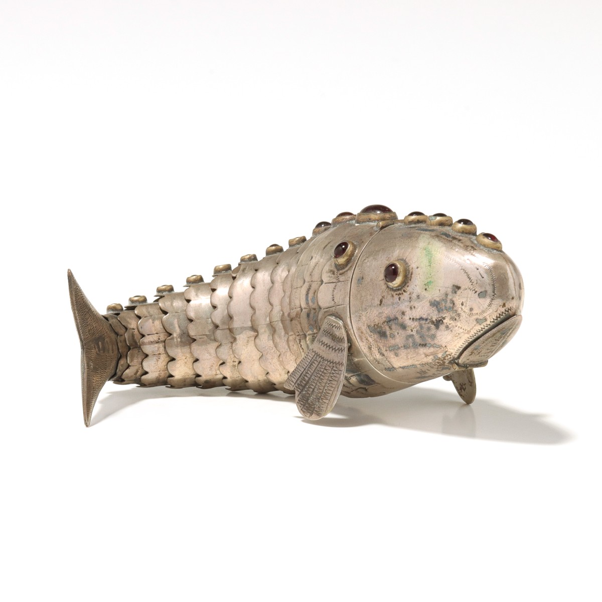 AN ARTICULATED FISH JUDAICA SPICE BOX WITH GARNETS