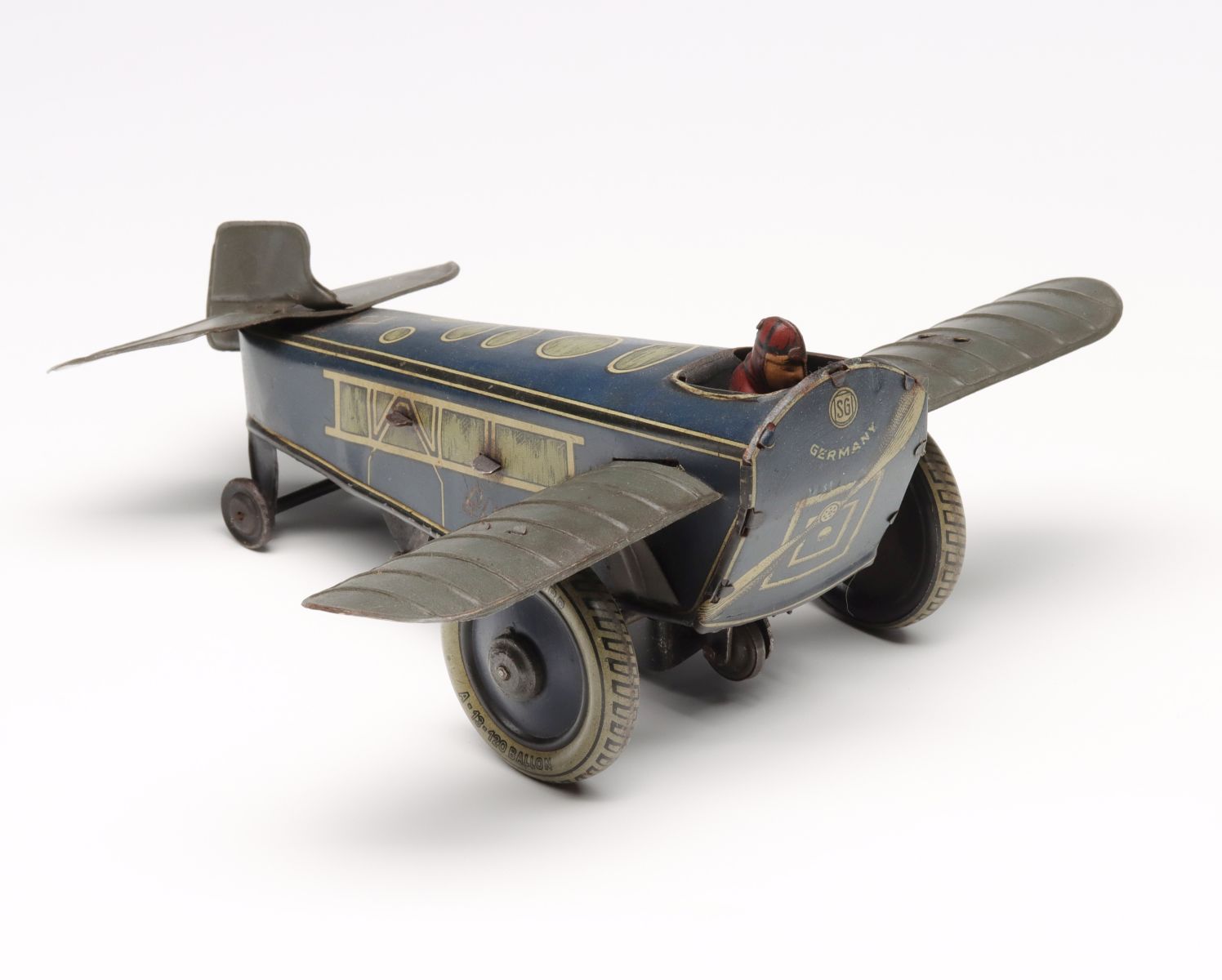 A GUNTHERMAN SG TIN LITHO WIND-UP ROLLOVER PLANE