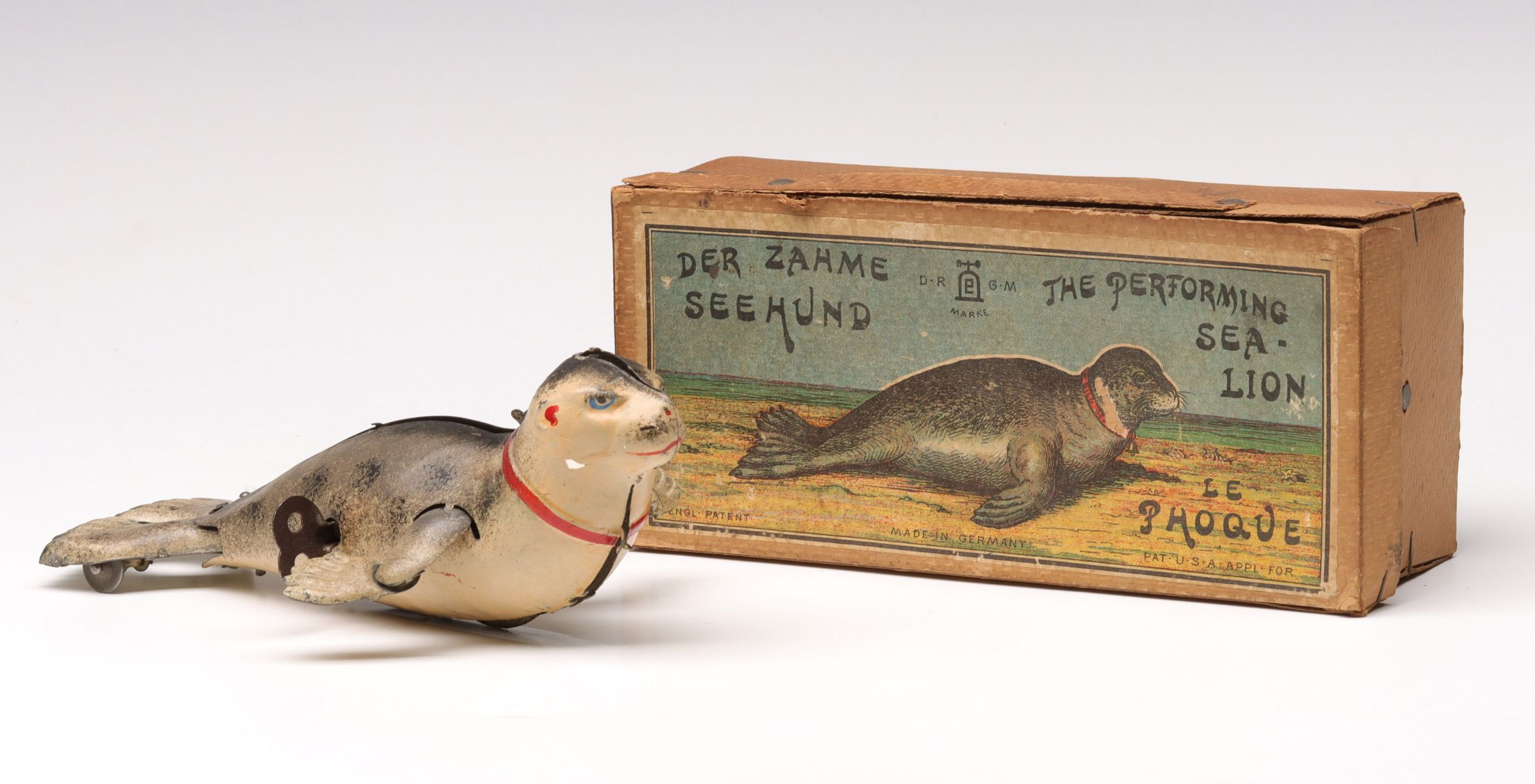 A LEHMANN PERFORMING SEA LION TIN WIND-UP IN BOX