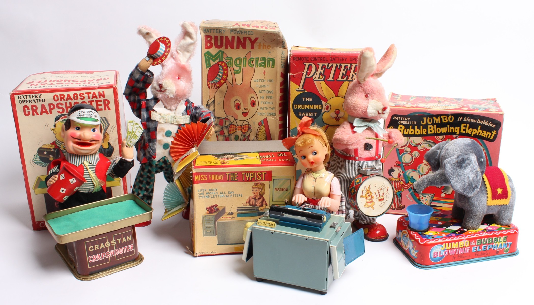 A COLLECTION OF BATTERY OPERATED TOYS IN ORIG BOX