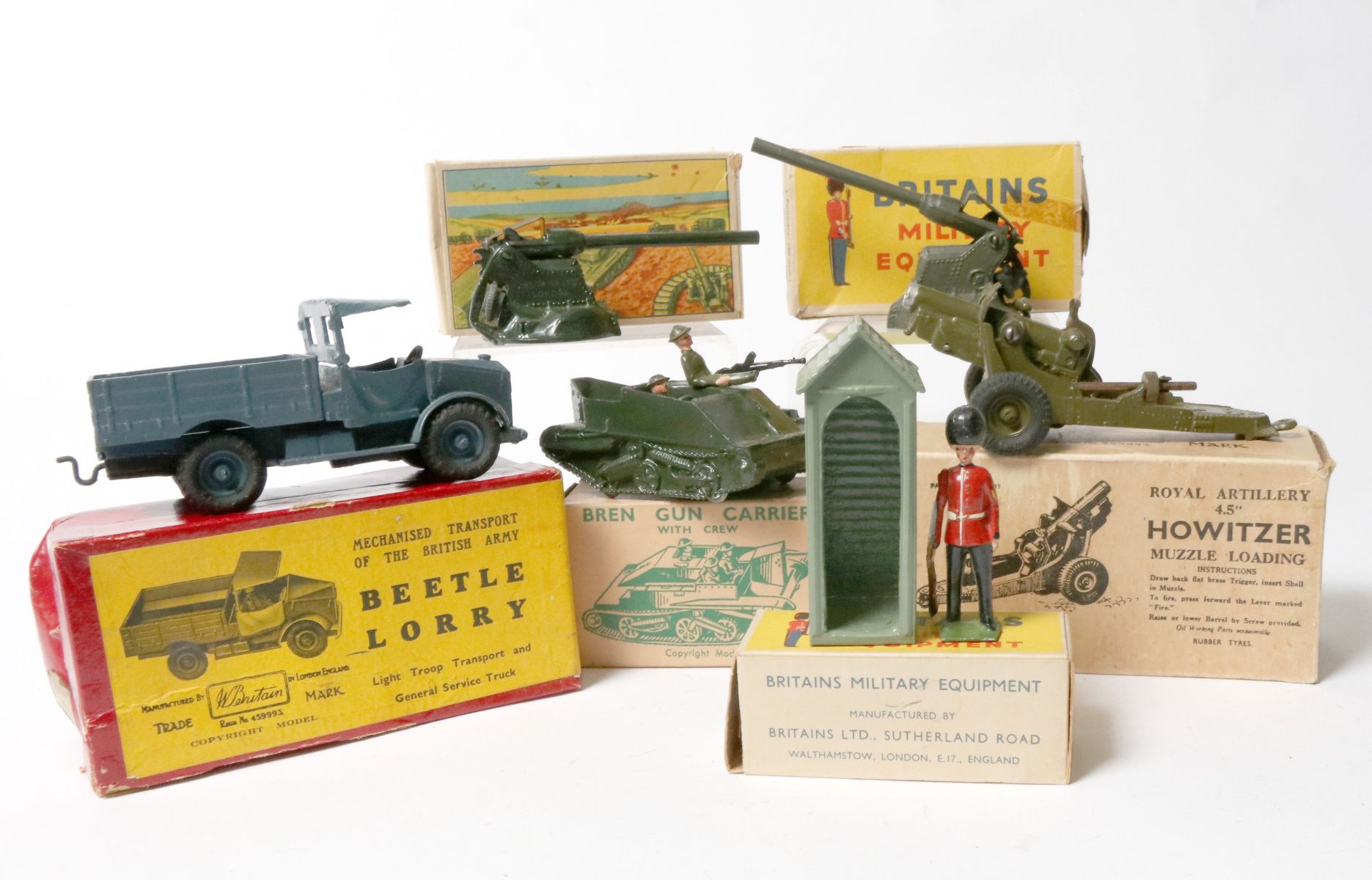 BRITAINS SENTRY W/HUT AND MILITARY VEHICLES IN BOX