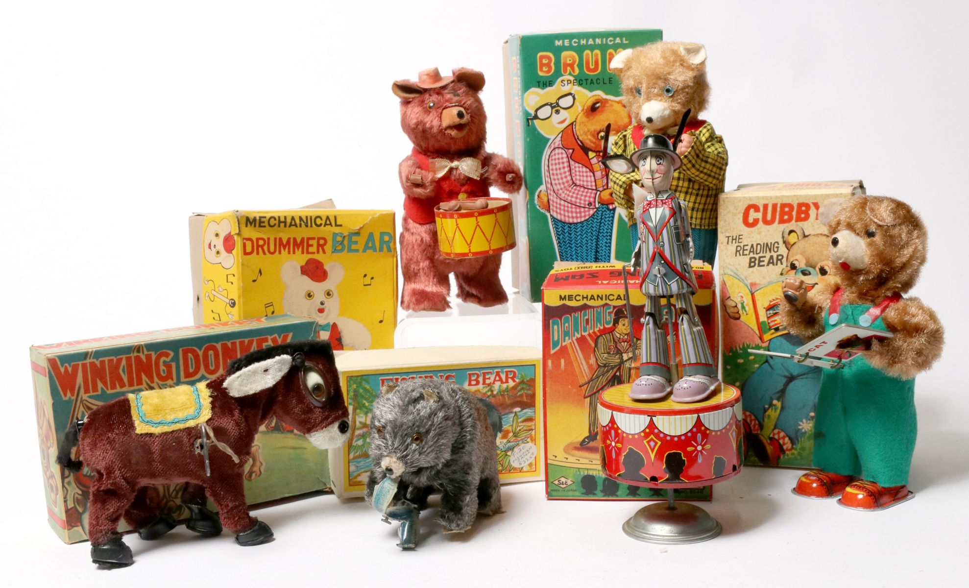 A COLLECTION OF VINTAGE WIND-UP TOYS IN ORIG BOX