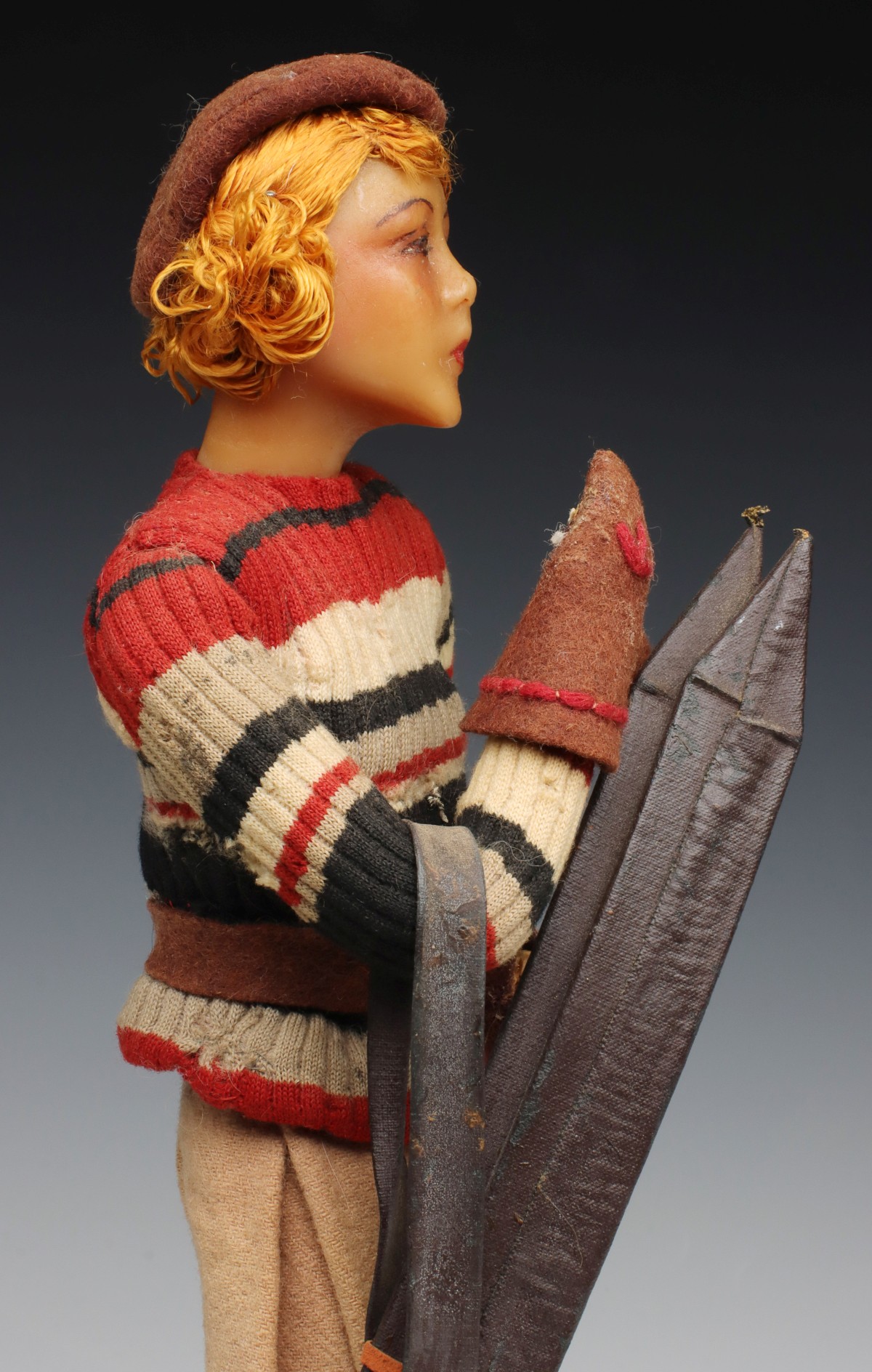 A 1920s FRENCH WAX FASHIONABLE LADY WITH SKIS DOLL