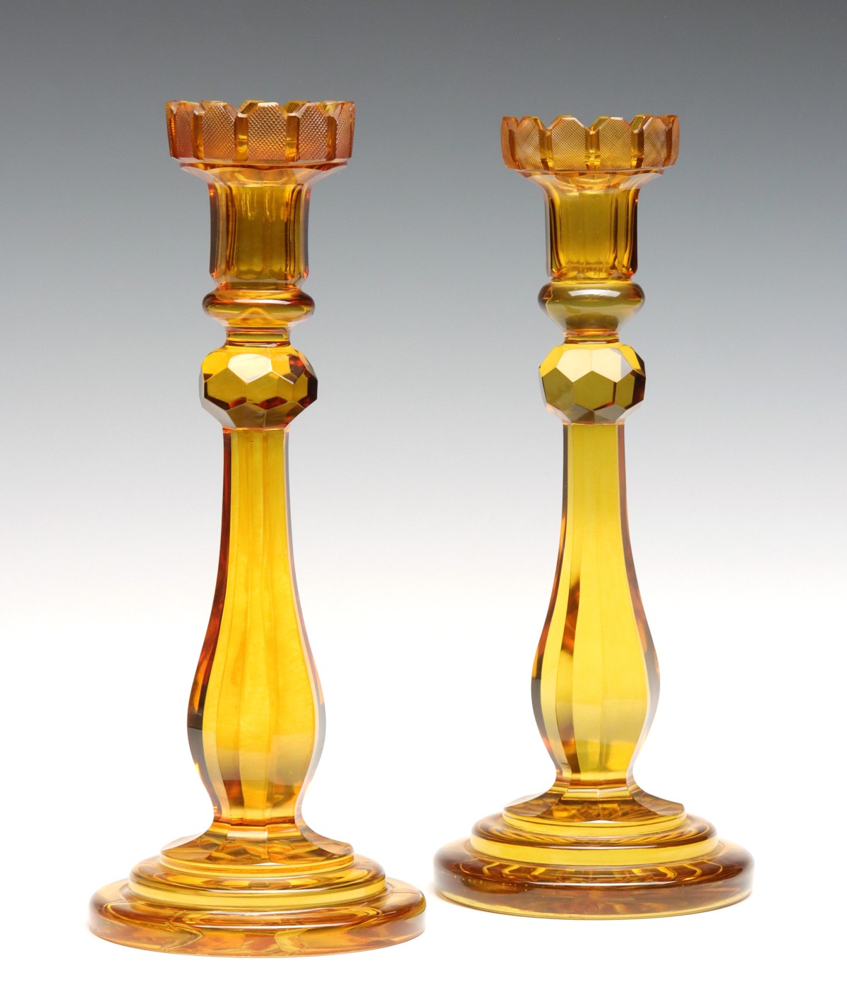 A PAIR 19TH C. BOHEMIAN CUT AND POLISHED CANDLESTICKS